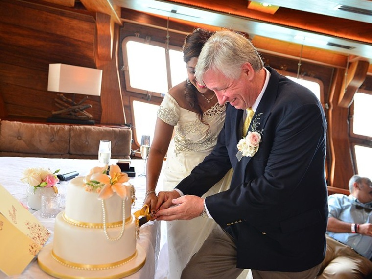 bride and groom cutting cake royal albatross