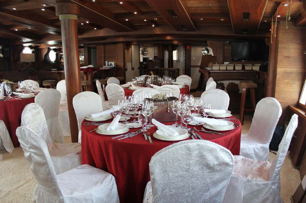 royal albatross grand salon with table set up for guests